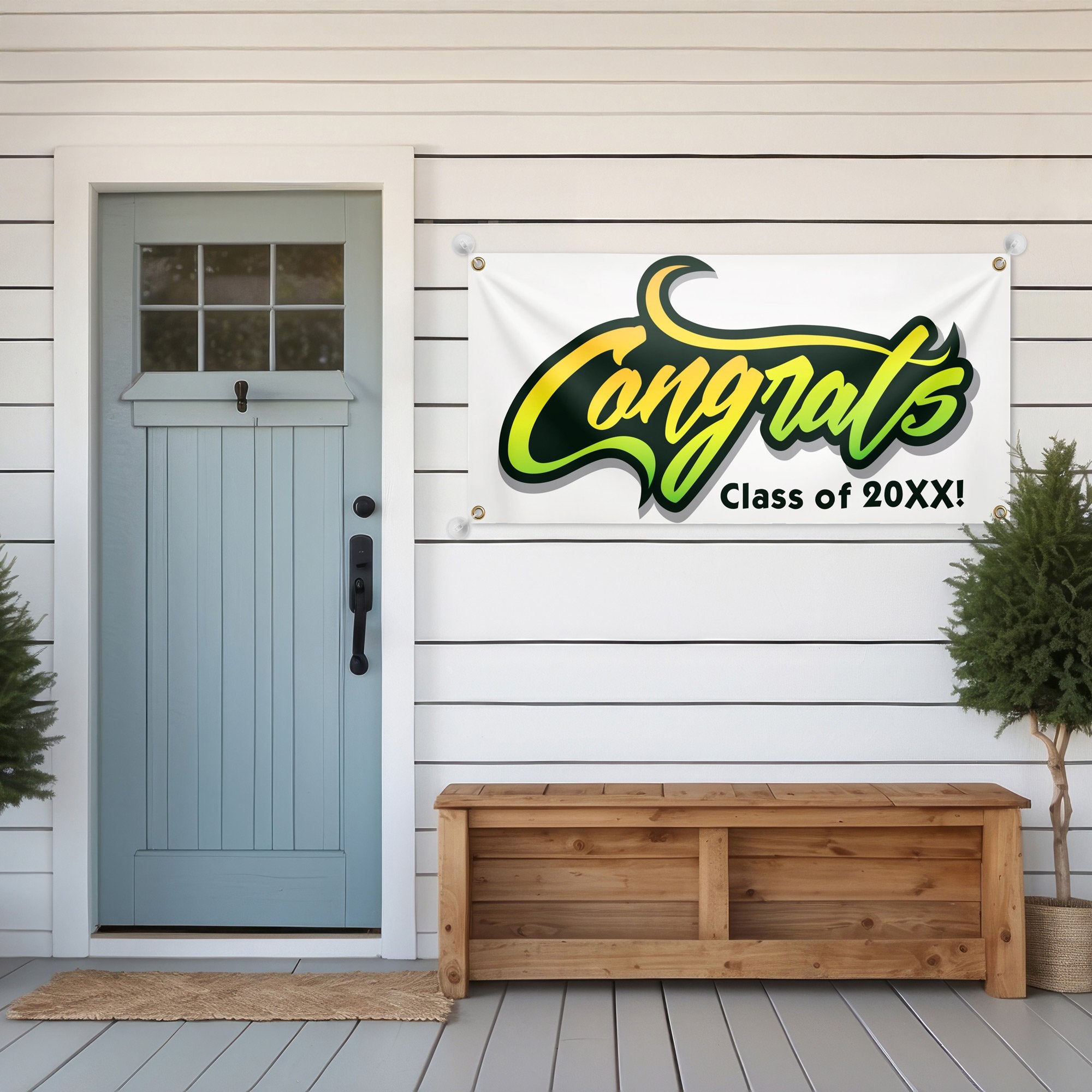Congrats Graduation Banner hanging on a house