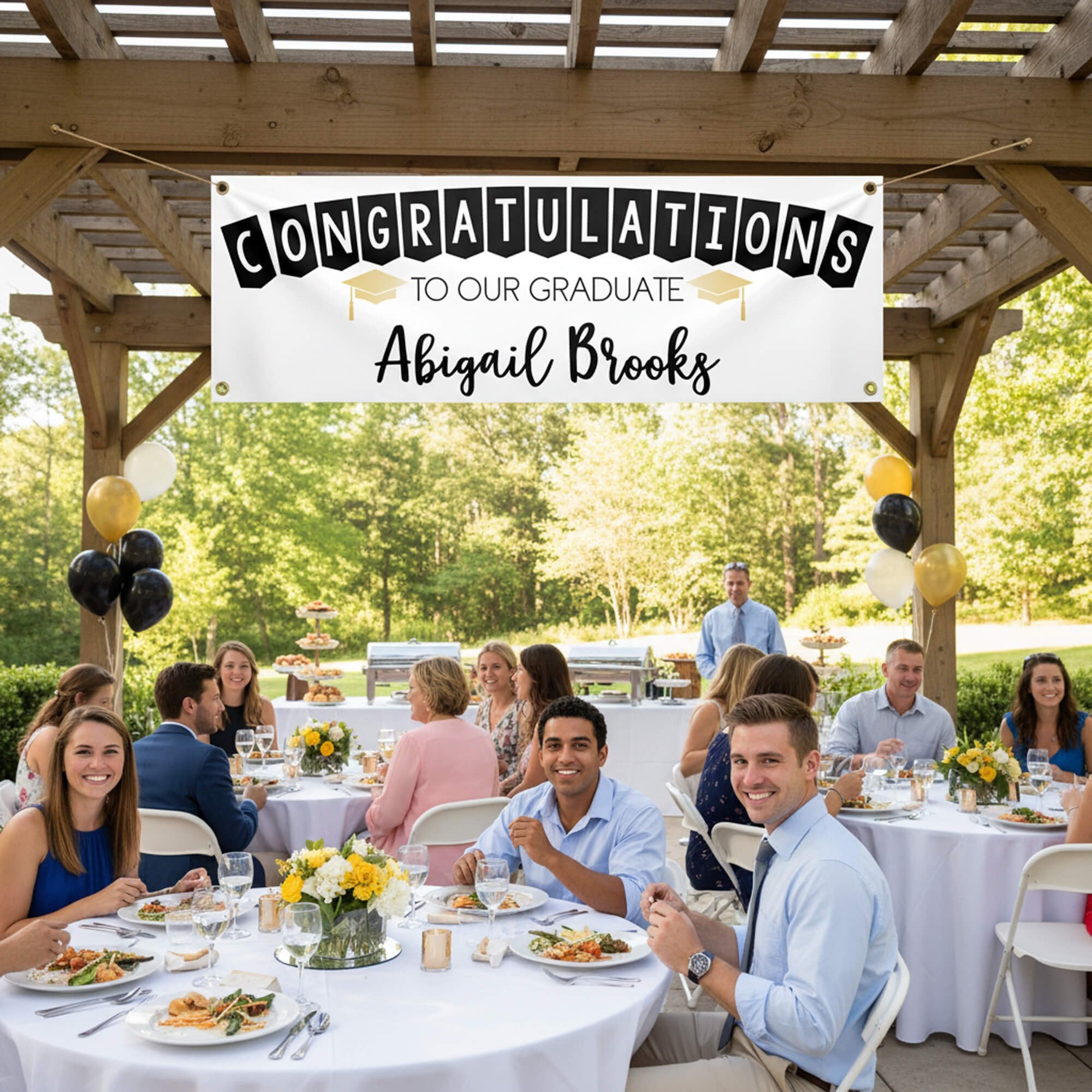  Congrats to Our Graduate Graduation Banner hanging from a pergola at a party