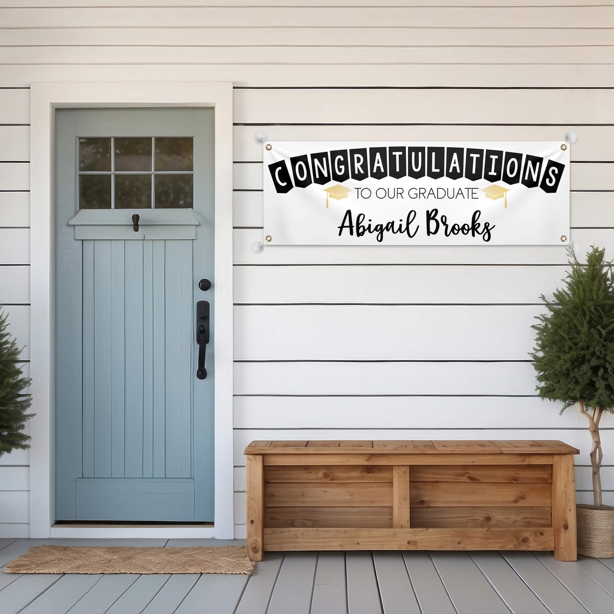  Congrats to Our Graduate Graduation Banner hanging on a house