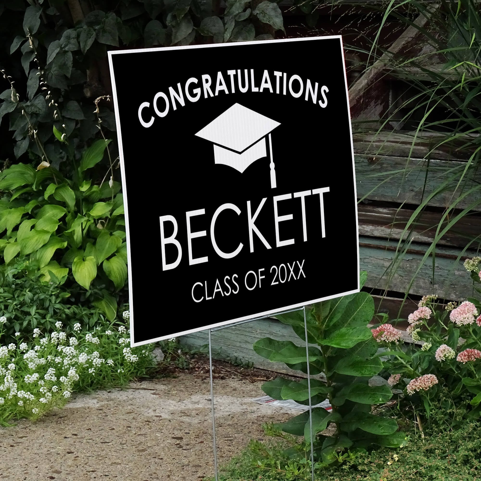 Congratulations Grad Cap Graduation Yard Sign by the Stairs