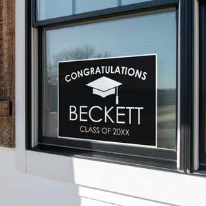 Congratulations Grad Cap Graduation Yard Sign in a Window