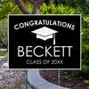 Congratulations Grad Cap Graduation Yard Sign Next to Pavement