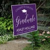 Congrats to our graduate yard sign displayed next to stairs