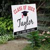 Class Diploma Graduation Yard Sign Next to Stairs