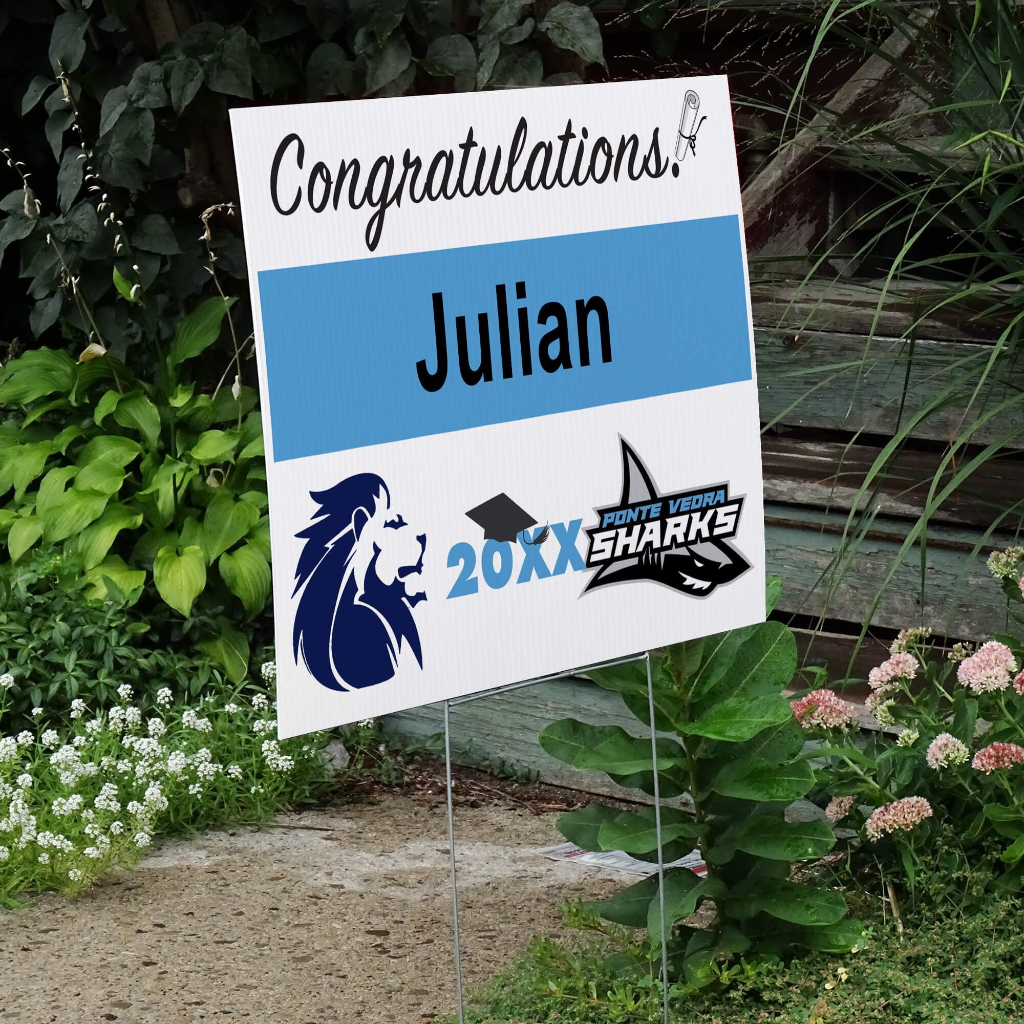 Double Logo Graduation Yard Sign Next to Stairs