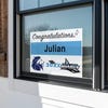 Double Logo Graduation Yard Sign in a Window