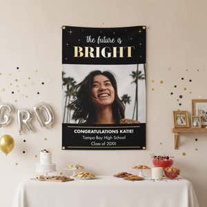 The Future Is Bright Graduation Banner hanging on a wall at a party