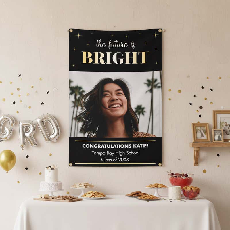 The Future Is Bright Graduation Banner hanging on a wall at a party