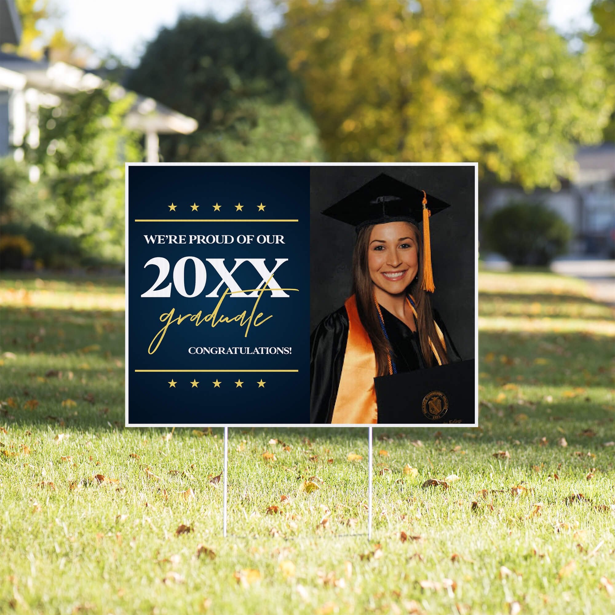 Star and Script custom graduation yard sign displayed in a front yard