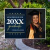 Star and Script custom graduation yard sign displayed in front of a fence