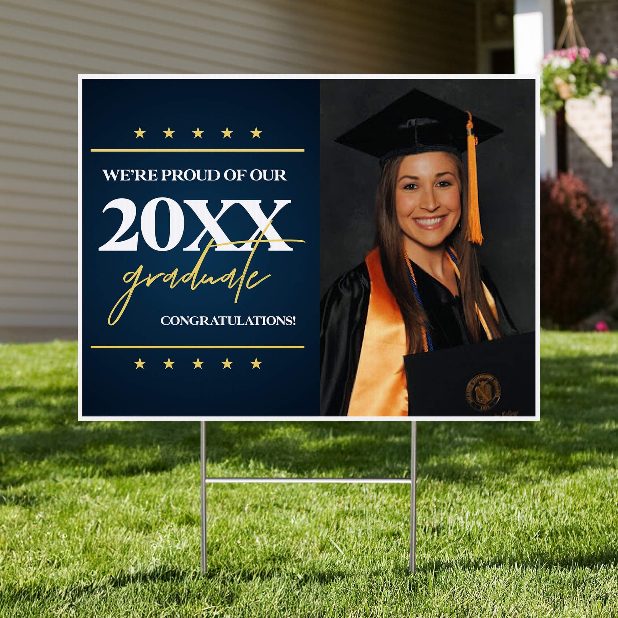 Star and Script custom graduation yard sign displayed in a front yard