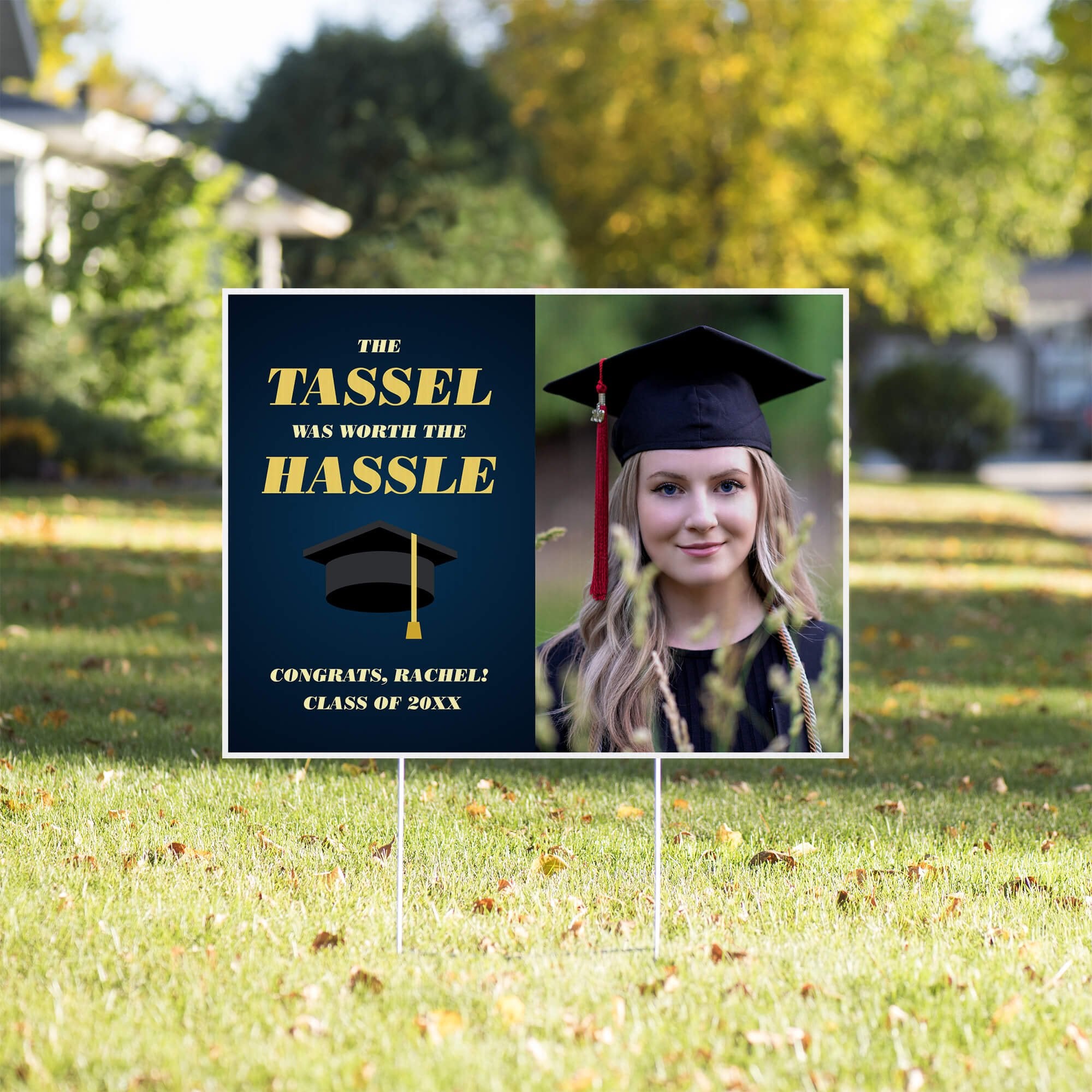 Tassel was worth the hassle graduation yard sign displayed in a yard