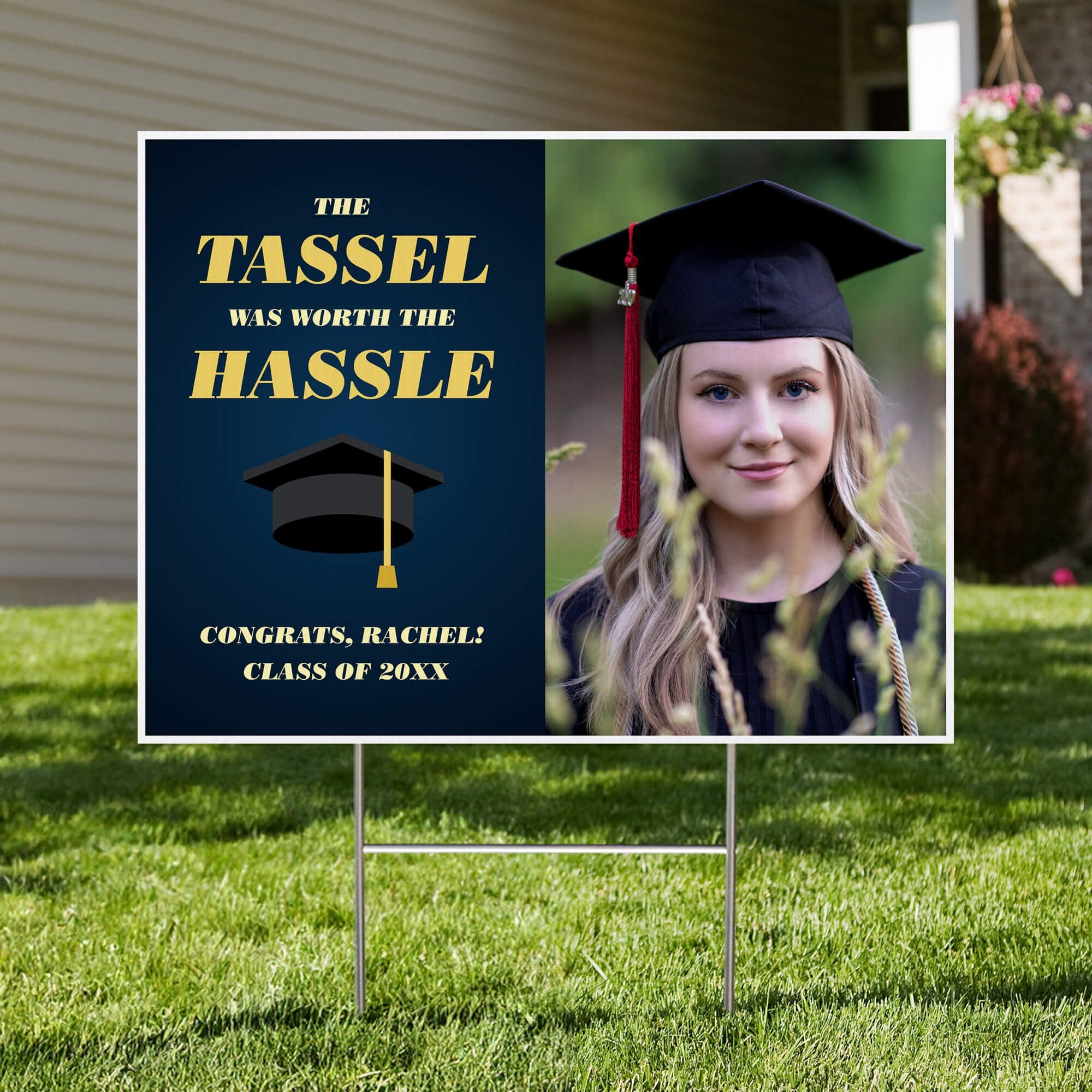 Tassel was worth the hassle graduation yard sign displayed in a front yard