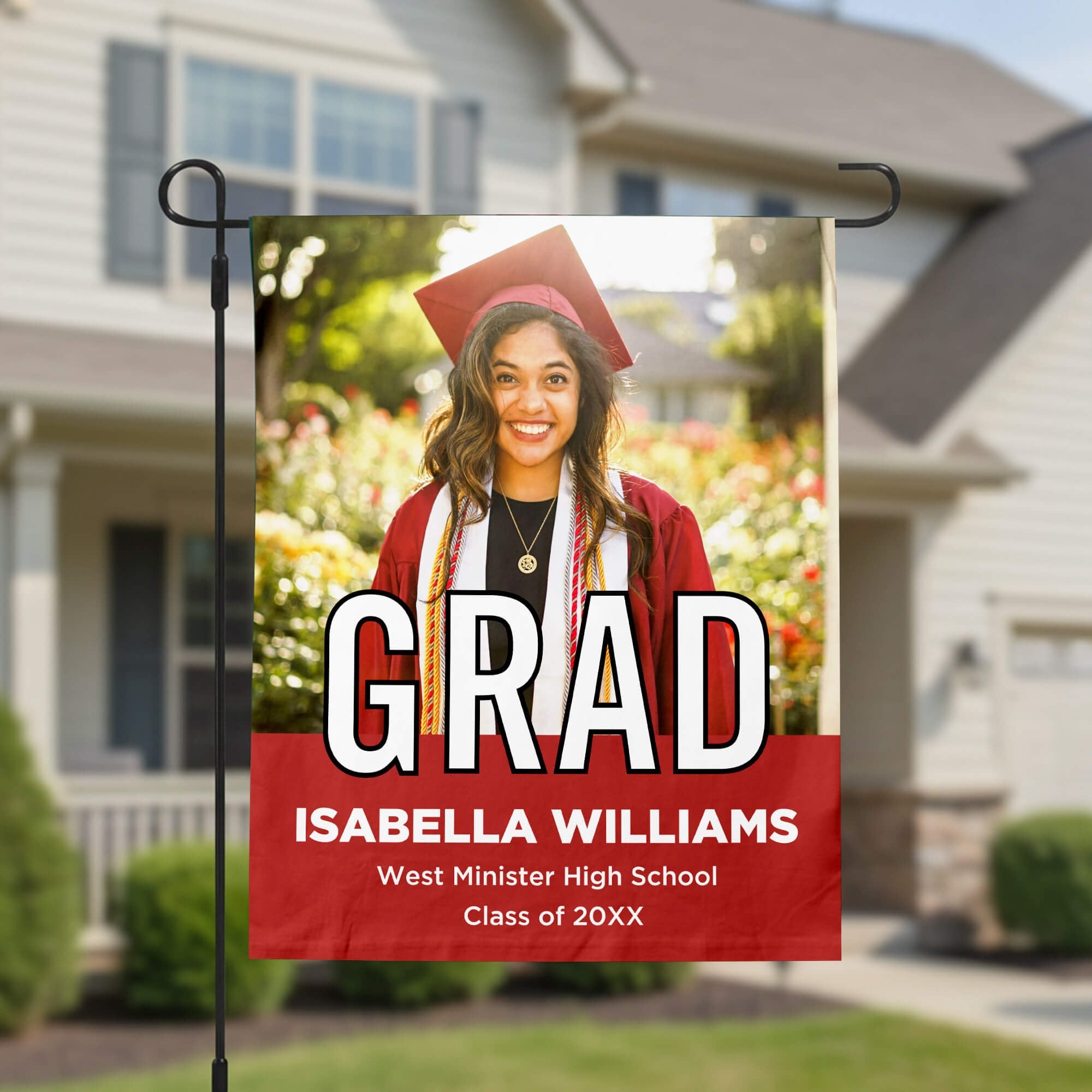Graduation Block Lettering Garden Flag in front of house