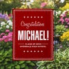 Graduation Bold Name Garden Flag in a garden