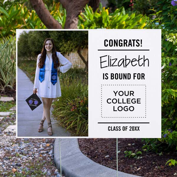 College bound graduation yard sign displayed next to pavement
