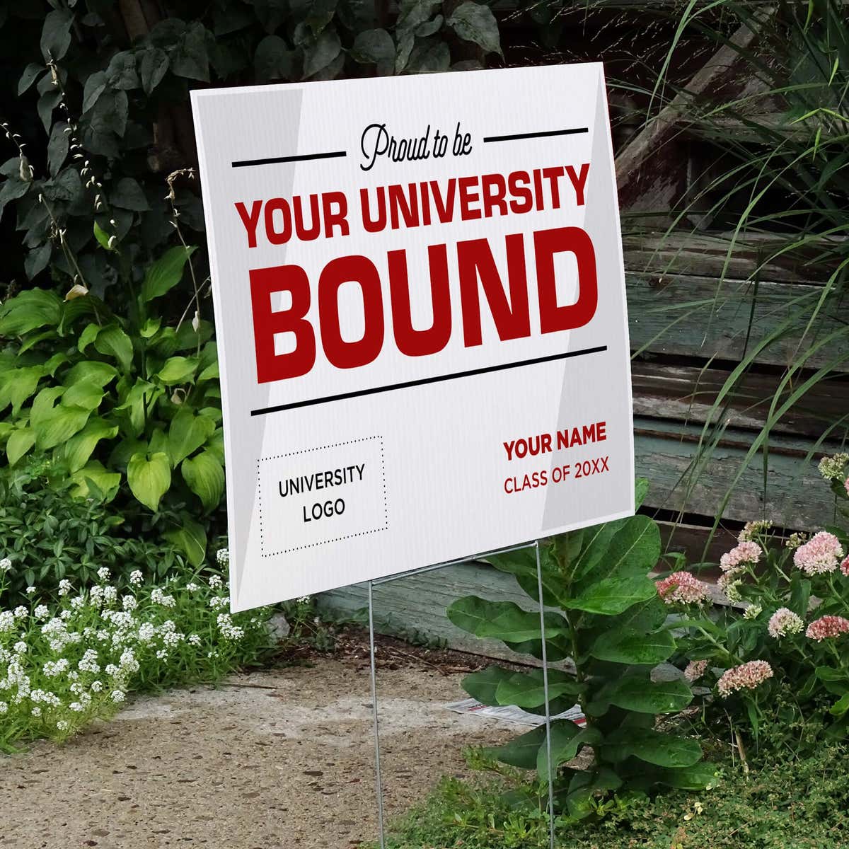 University logo graduation yard sign displayed by stairs