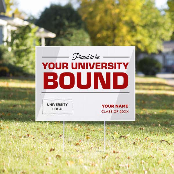 University logo graduation yard sign displayed in a sunny yard