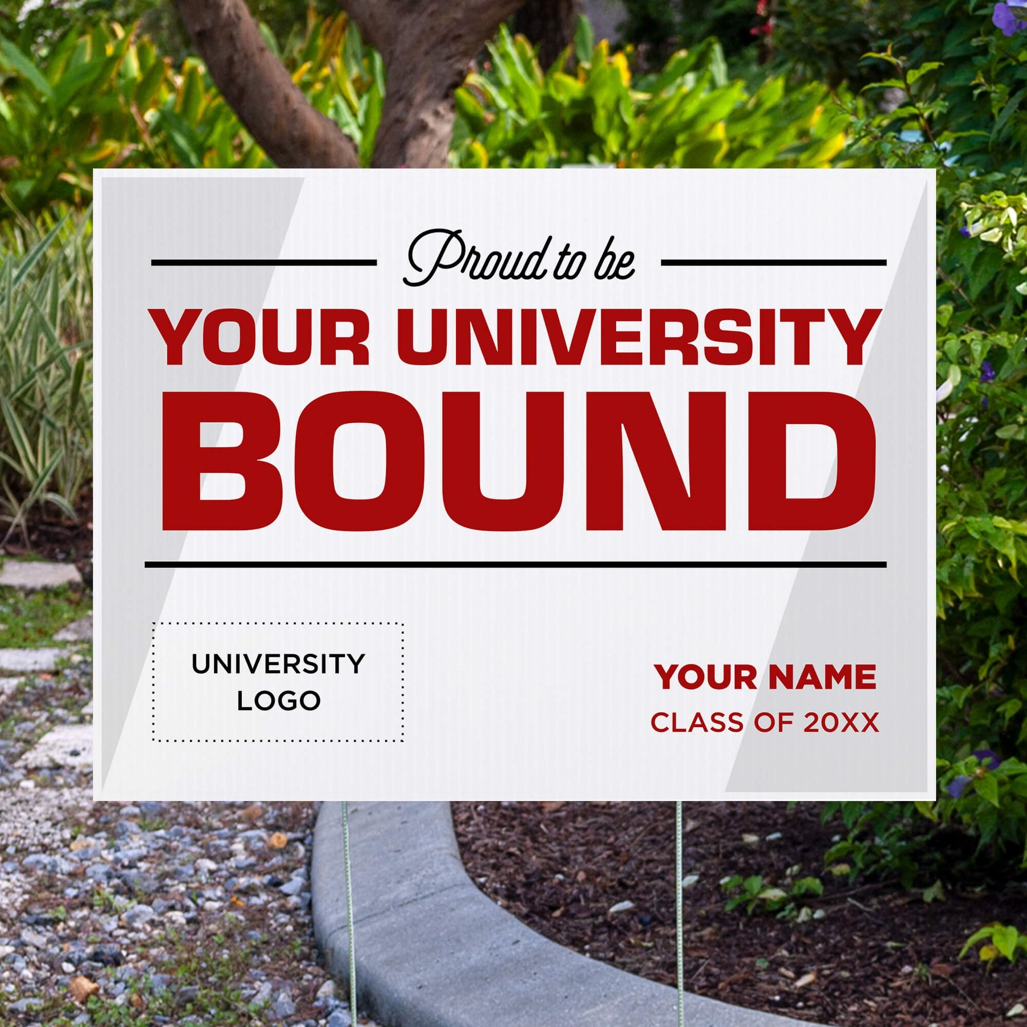 University logo graduation yard sign displayed by pavement 