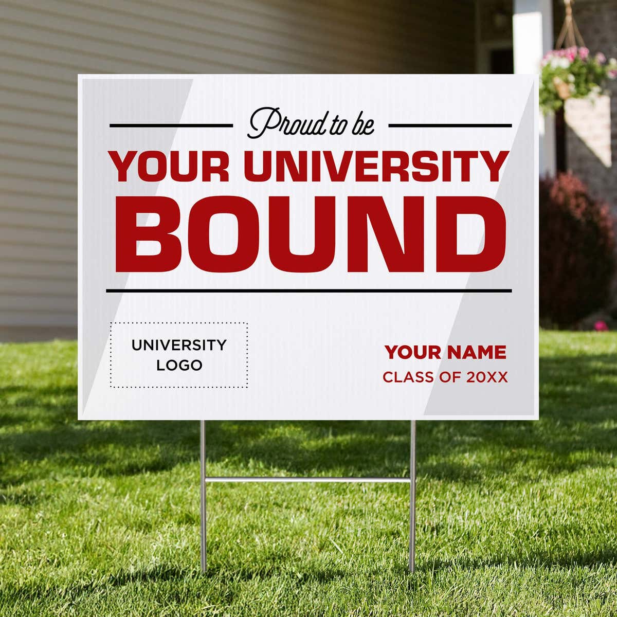 University logo graduation yard sign displayed in a front yard
