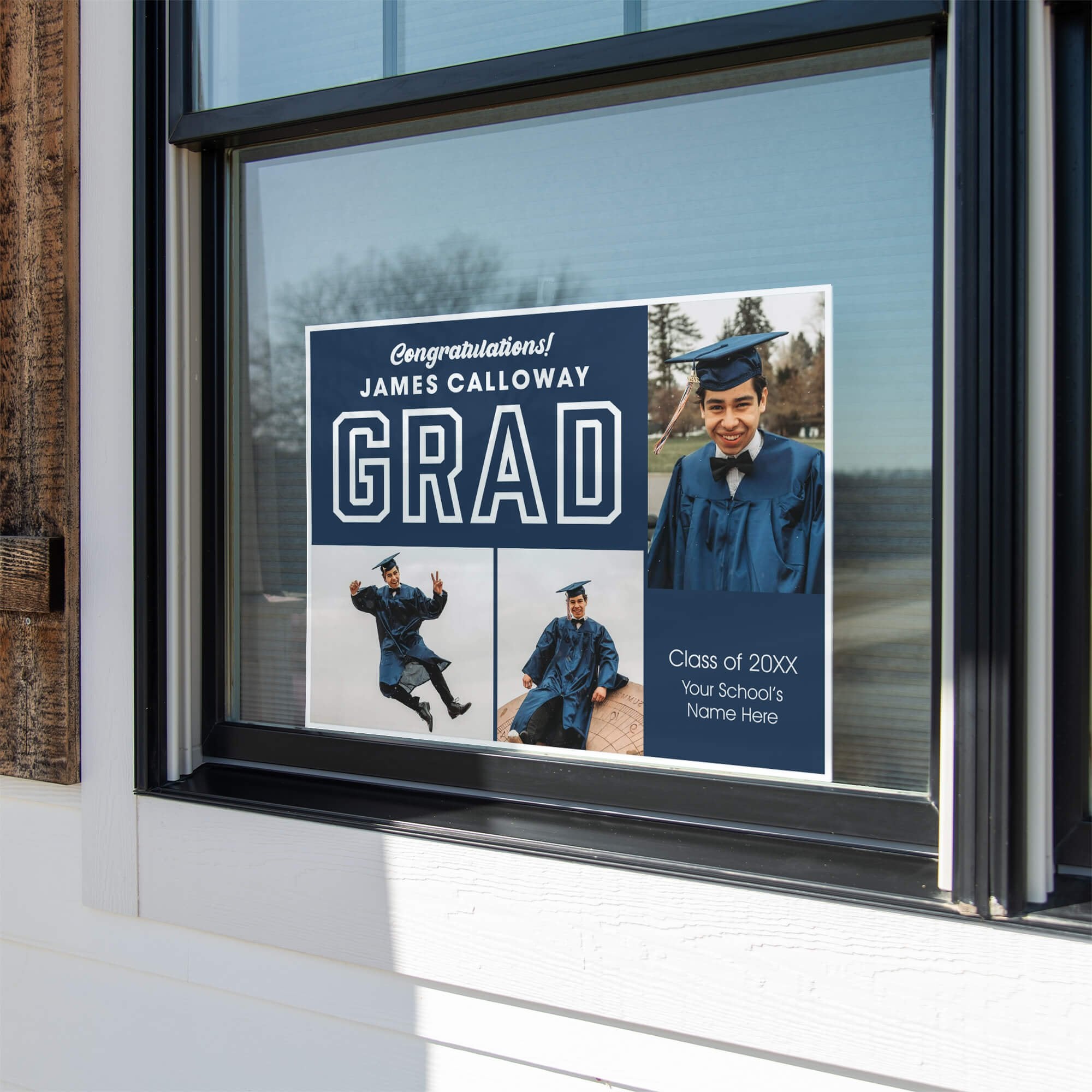 Three Photos Graduation Yard Sign displayed in a window
