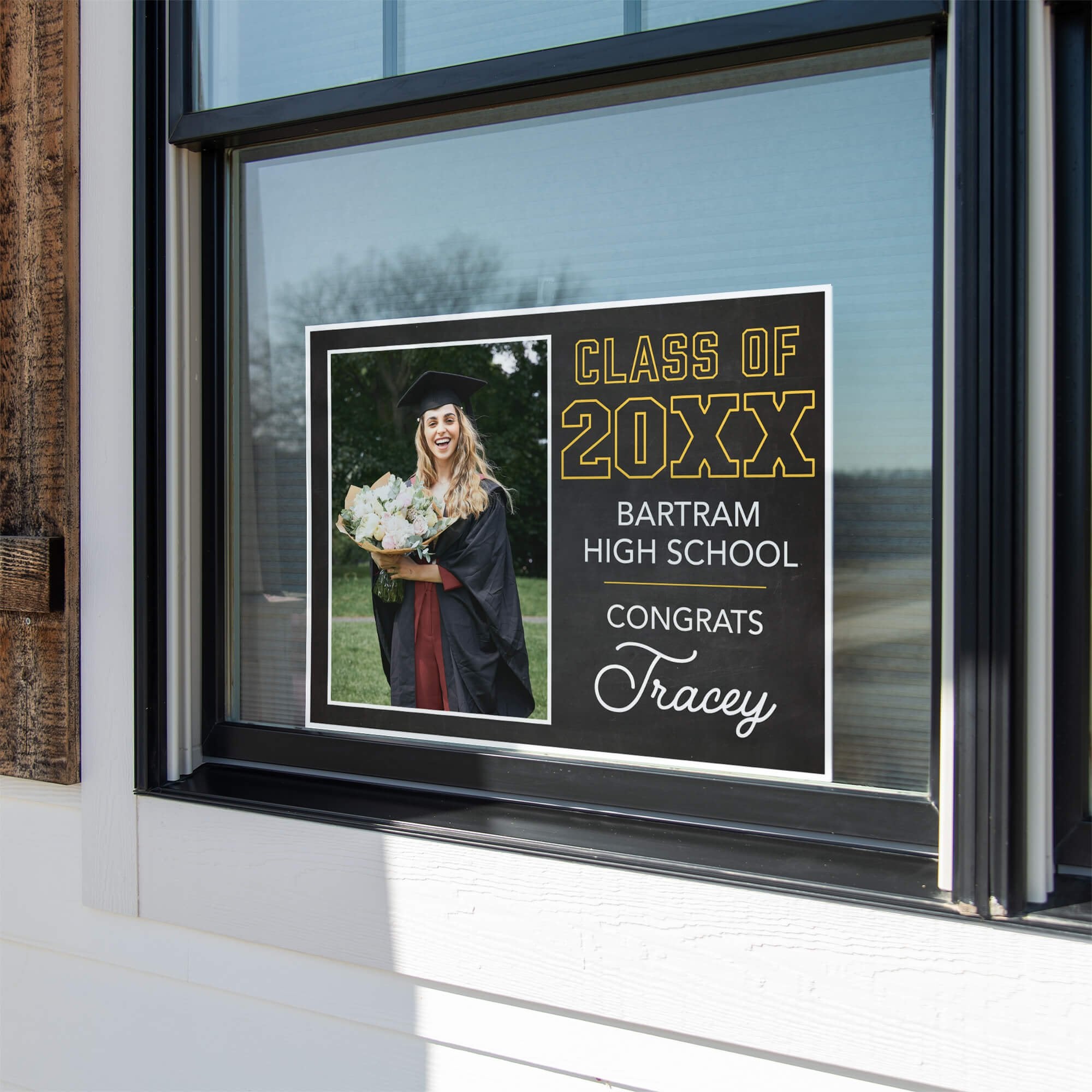 Chalkboard Design Graduation Yard Sign displayed in a window