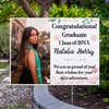 Floral Design and Note Graduation Yard Sign displayed by pavement