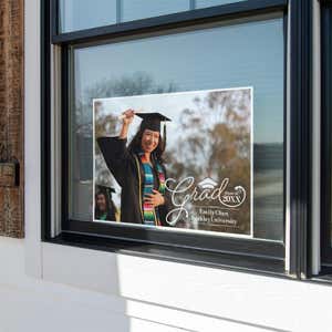 Graduation Yard Sign Script Text displayed in a window