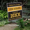 Gold Stars Graduation Yard Sign displayed by a pathway leading to stairs