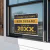Gold Stars Graduation Yard Sign displayed in a window