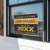 Gold Stars Graduation Yard Sign displayed in a window
