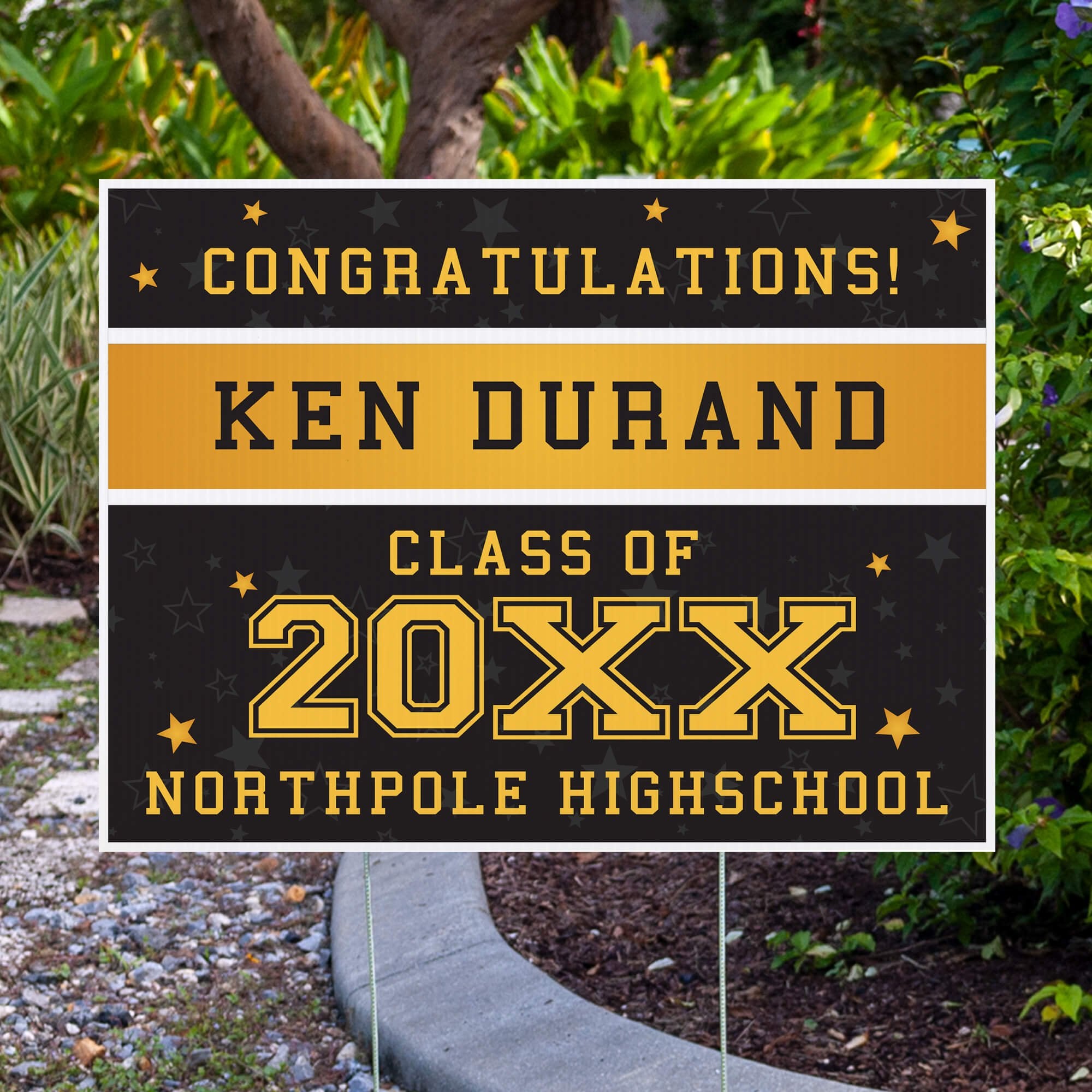 Gold Stars Graduation Yard Sign displayed by pavement