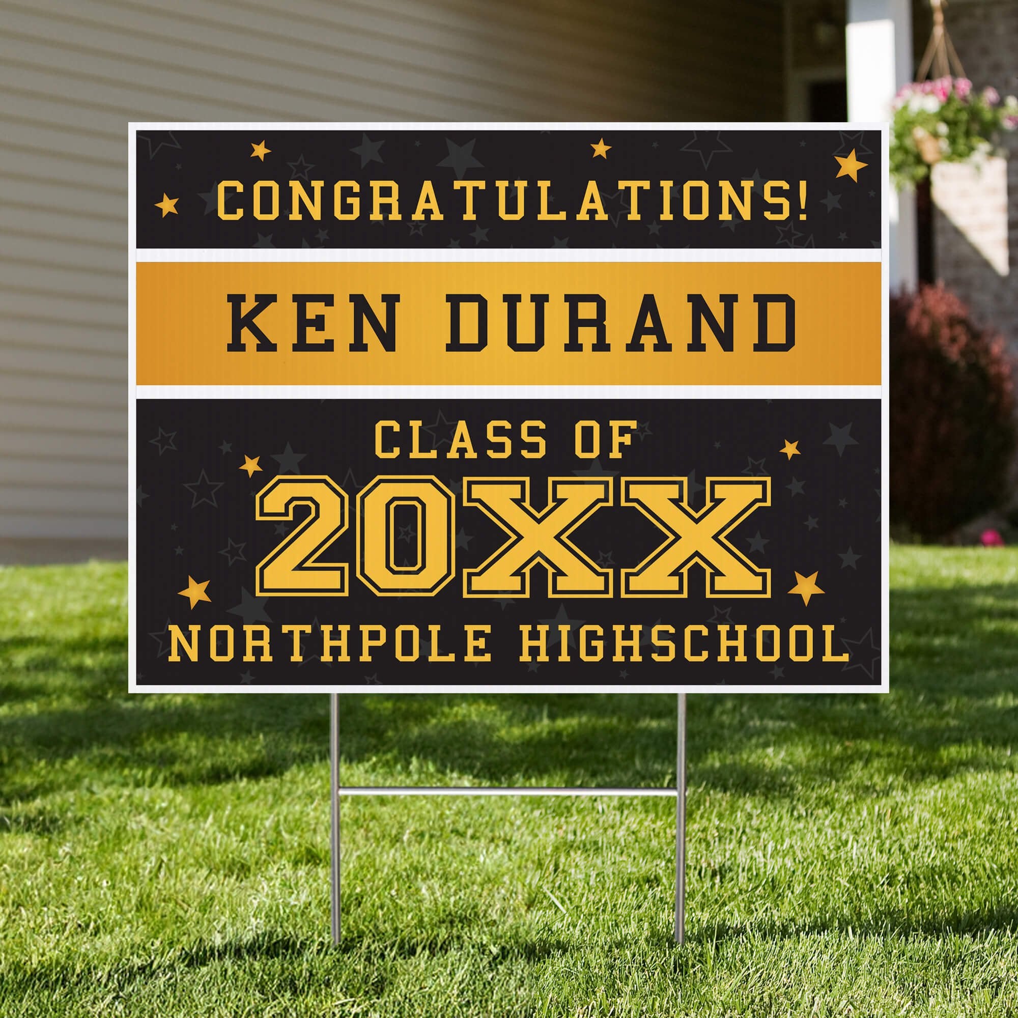 Gold Stars Graduation Yard Sign displayed in a front yard