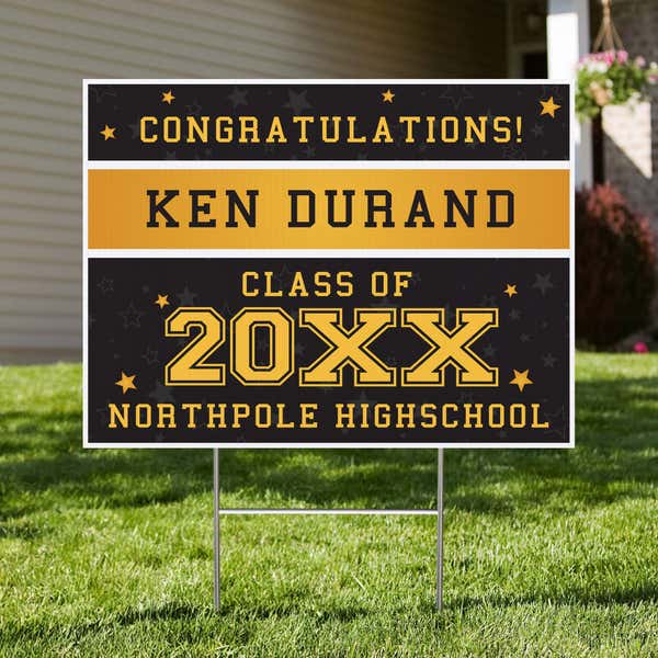 Gold Stars Graduation Yard Sign displayed in a front yard
