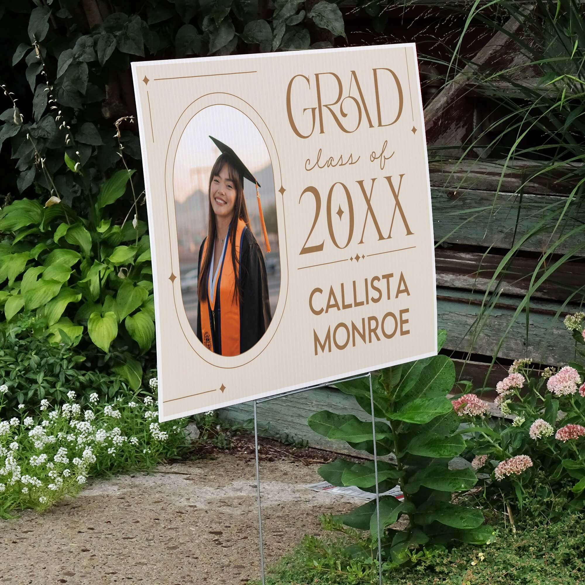 Modern Minimalist Graduation Yard Sign displayed by a pathway leading to stairs