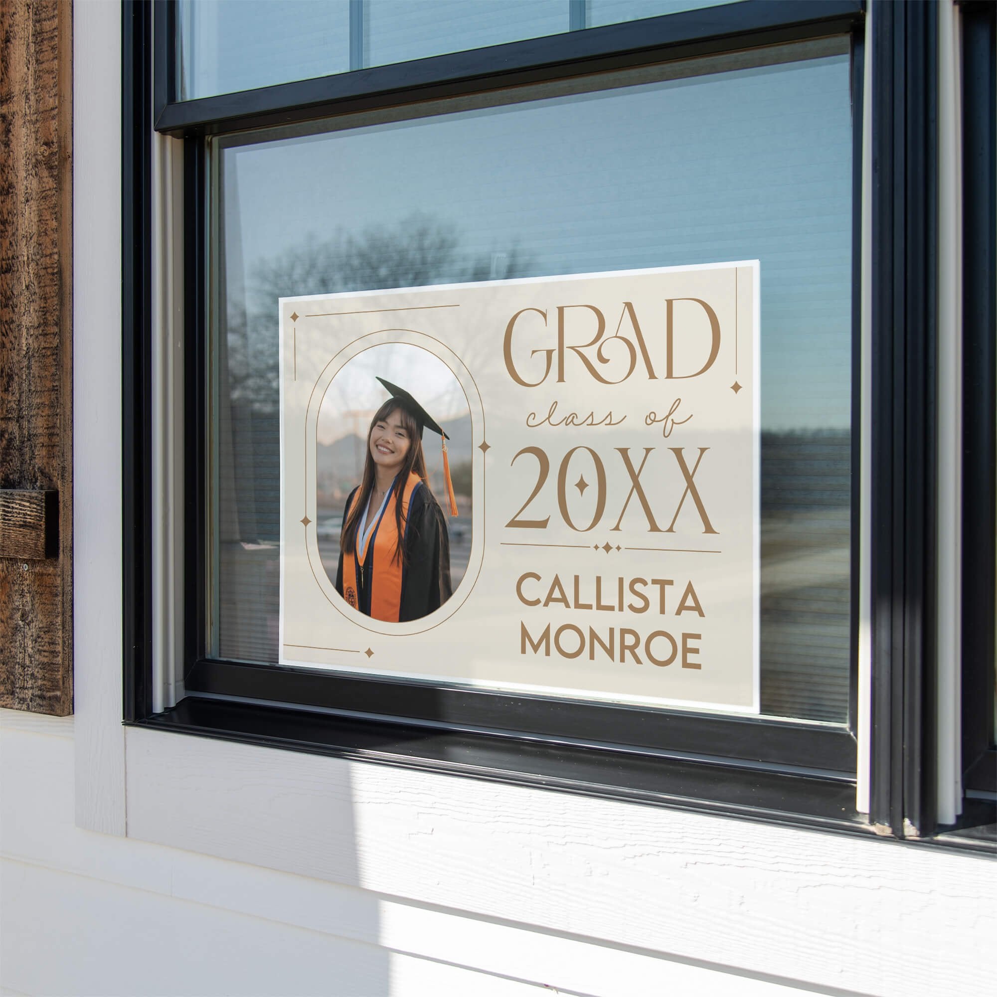 Modern Minimalist Graduation Yard Sign displayed in a window