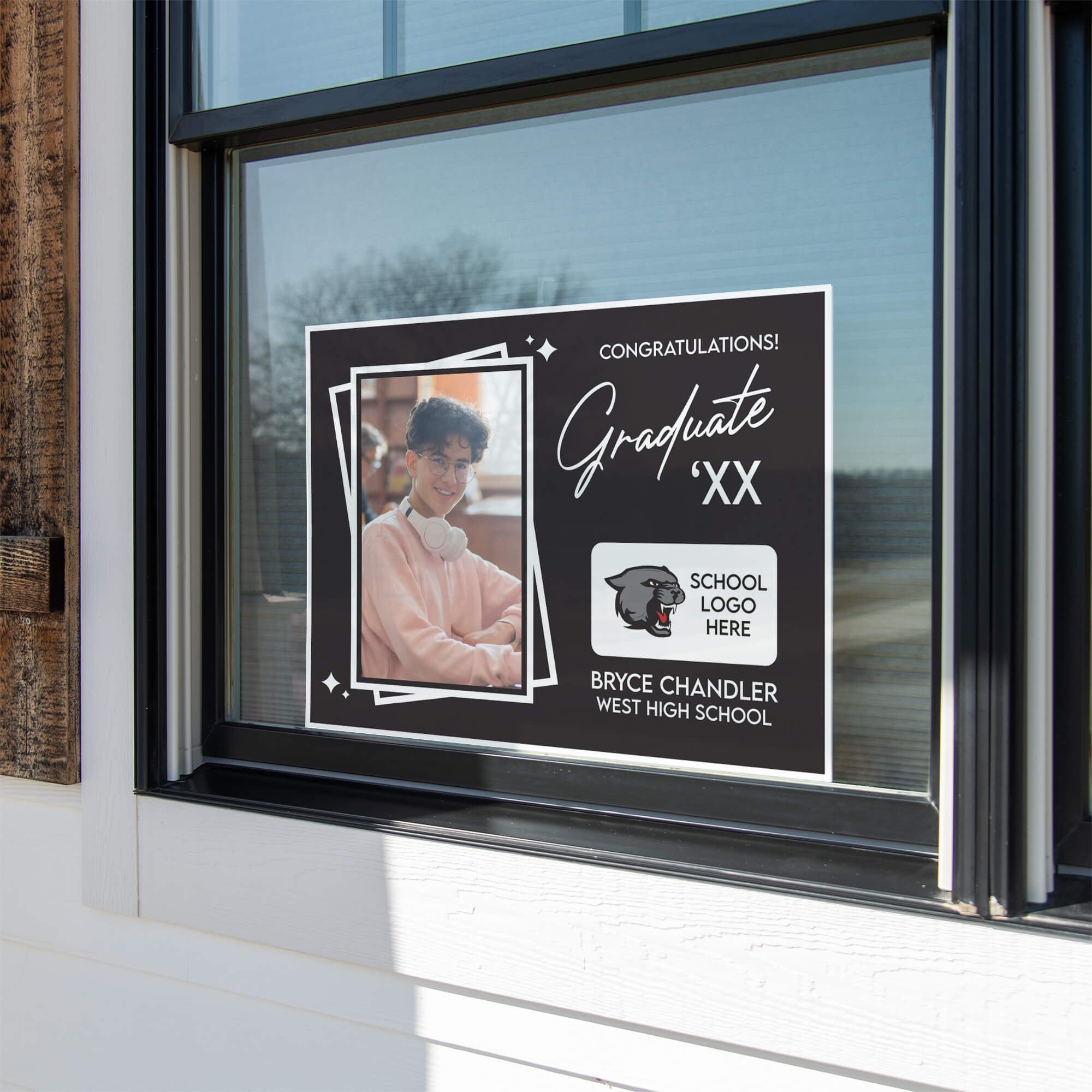 Picture Frame Graduation Yard Sign displayed in a window