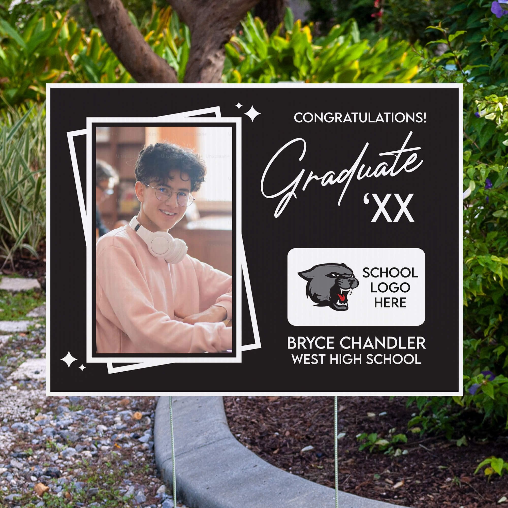 Picture Frame Graduation Yard Sign displayed by pavement