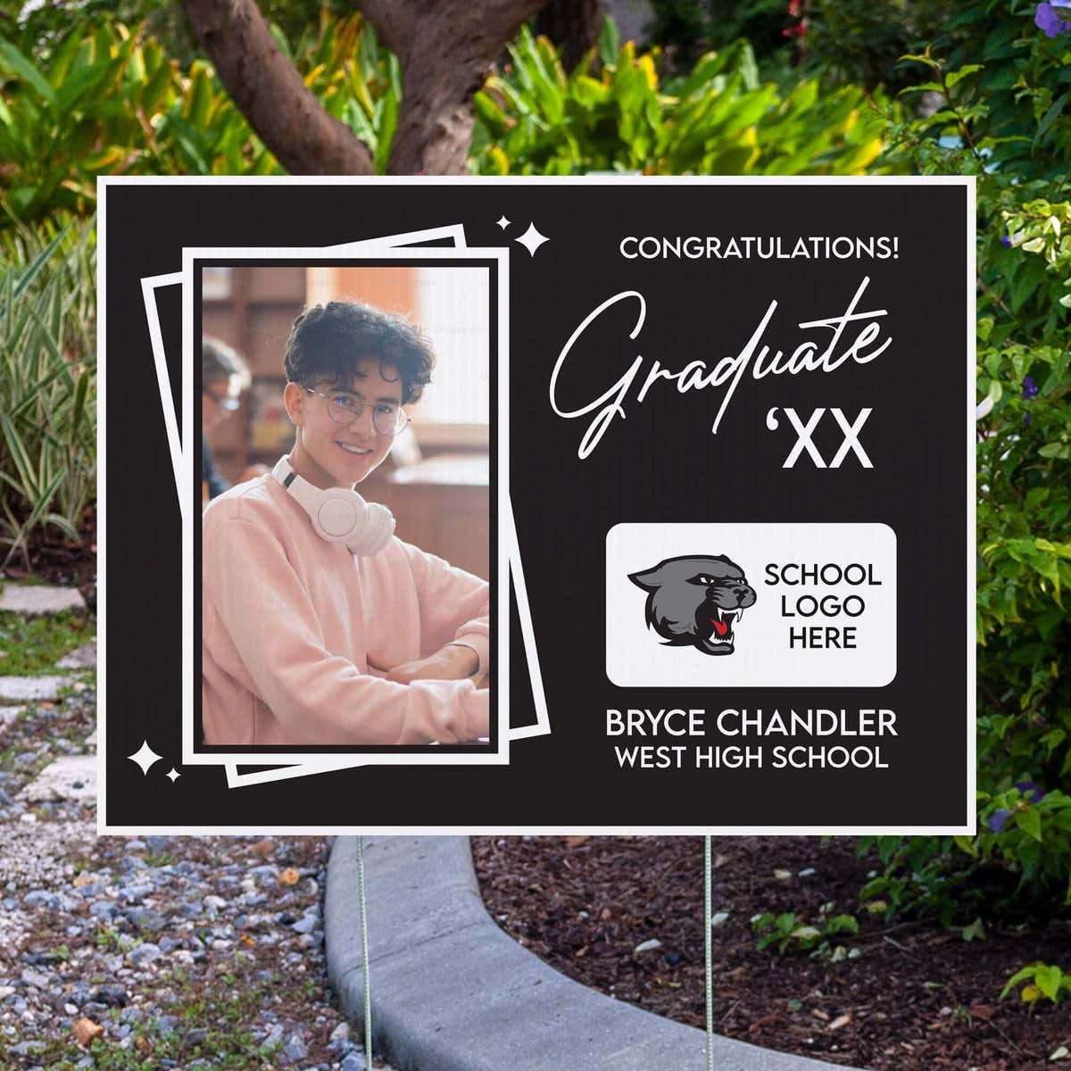 Picture Frame Graduation Yard Sign displayed by pavement
