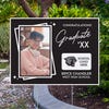 Picture Frame Graduation Yard Sign displayed by pavement