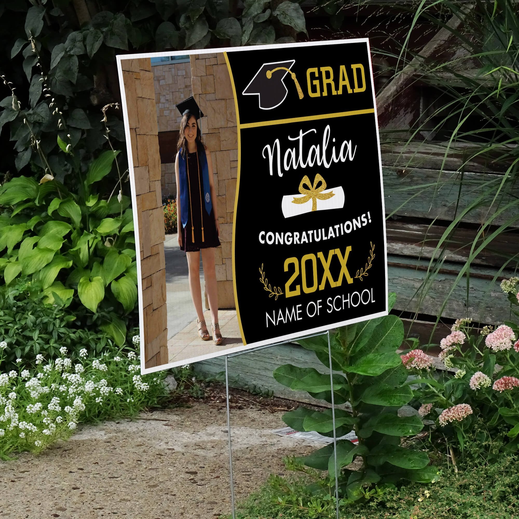 Wave Design Graduation Yard Sign displayed by a pathway leading to stairs