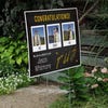 You Did It | Graduation Yard Sign displayed by a pathway leading to stairs