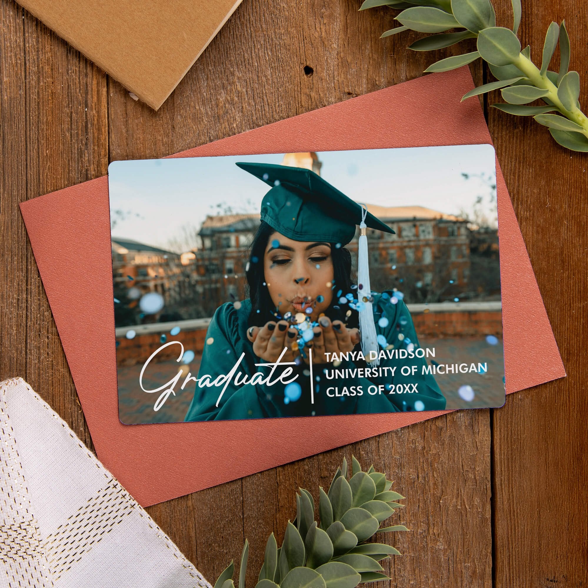 Custom Photo Graduation Announcement photo magnet displayed on an envelope 