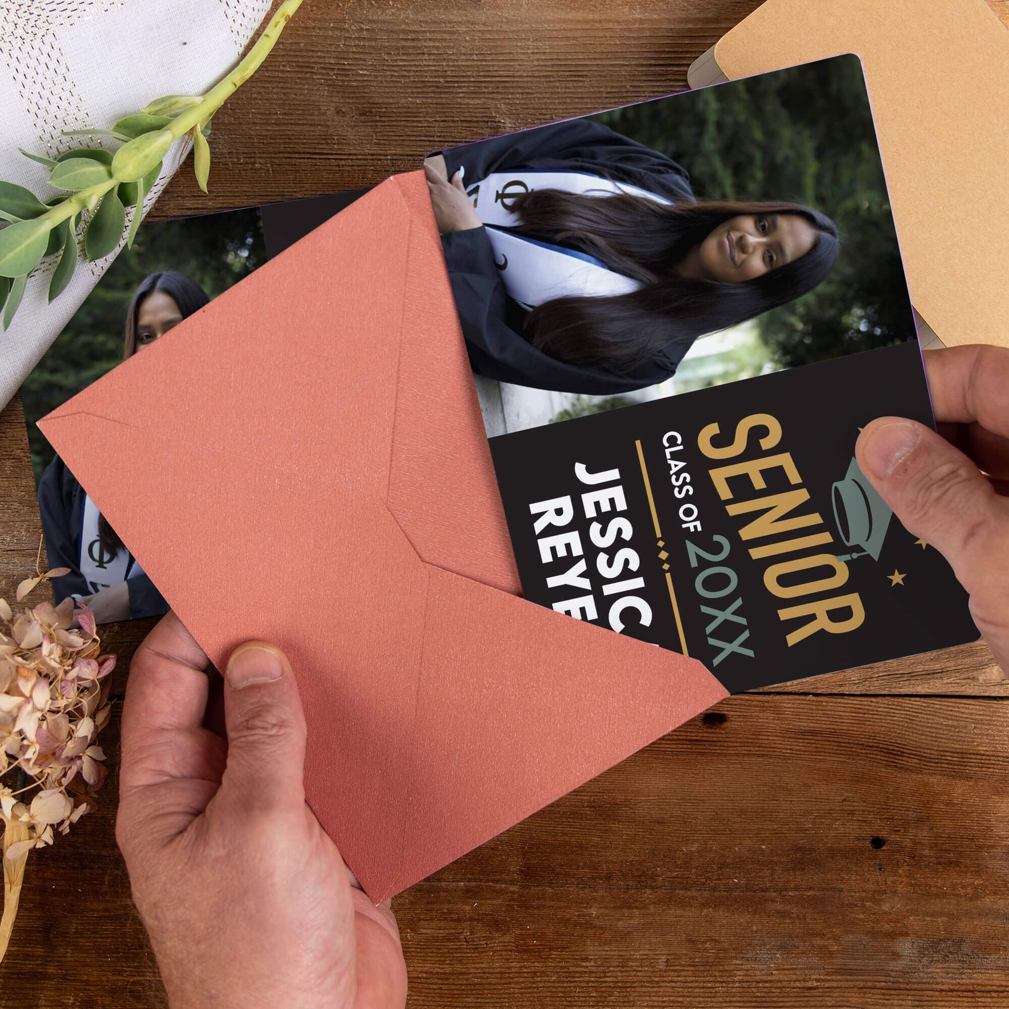 Personalized Modern Design Senior Graduation Announcement magnet being placed into a rose colored envelope