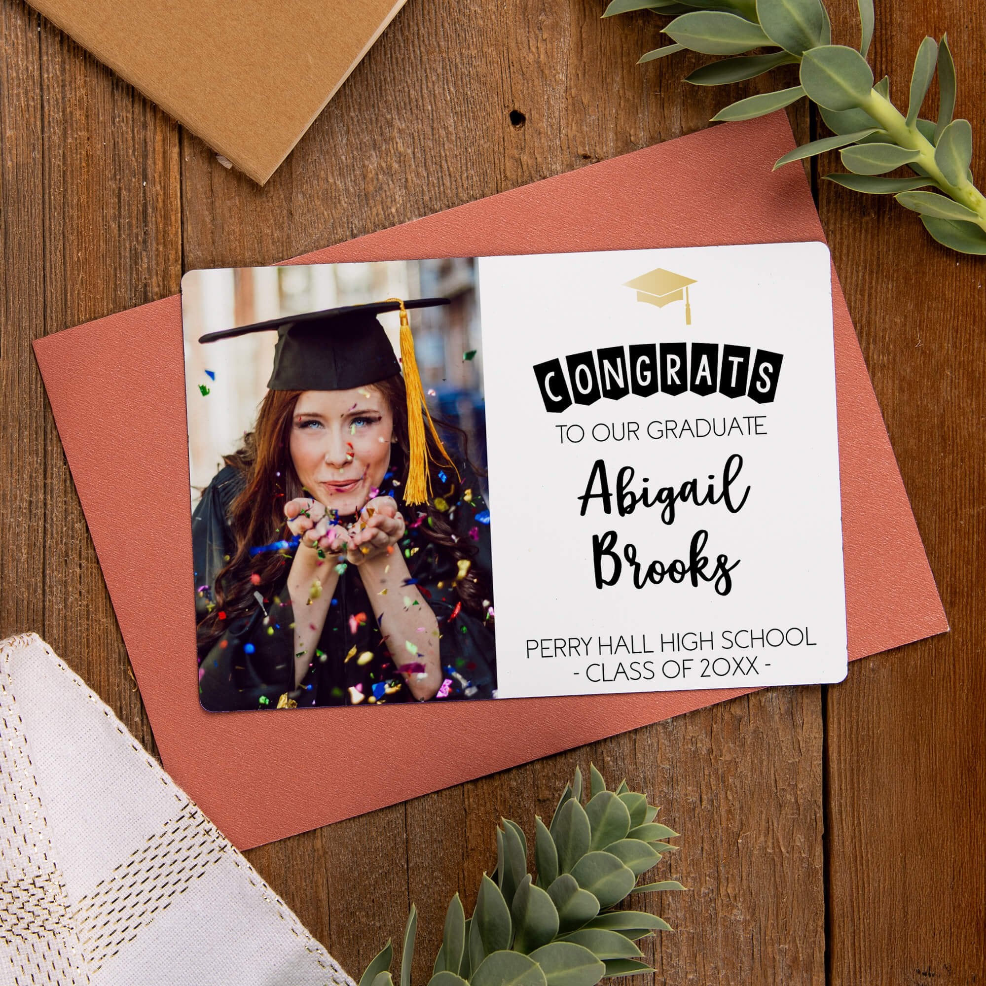 Custom photo magnet displayed on an envelope 