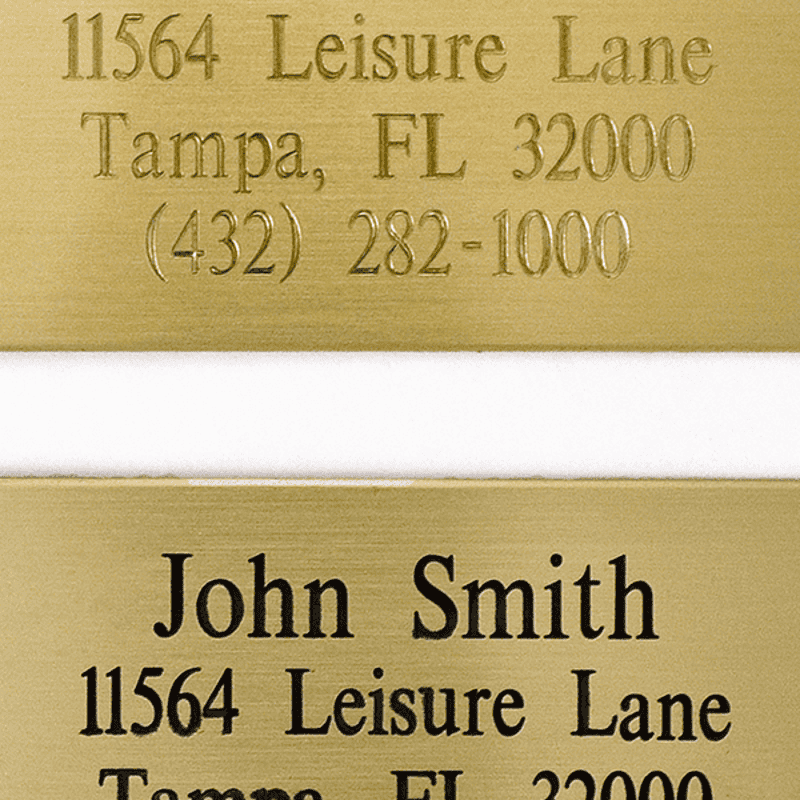 Two examples of 2" x 6" brass plates