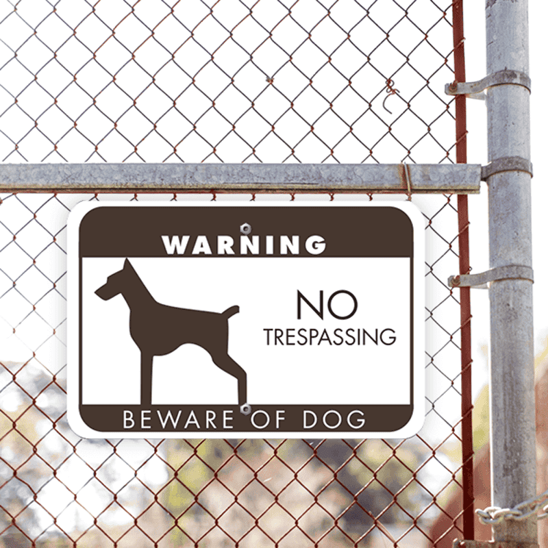 No Trespassing Beware of Dog Horizontal Sign Lifestyle Photo Outside