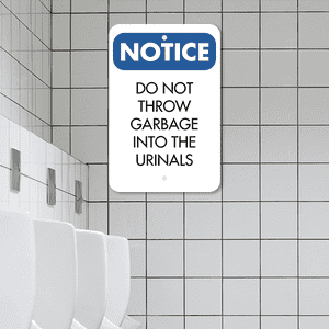 Mounted Vertical No Garbage in Urinals Sign