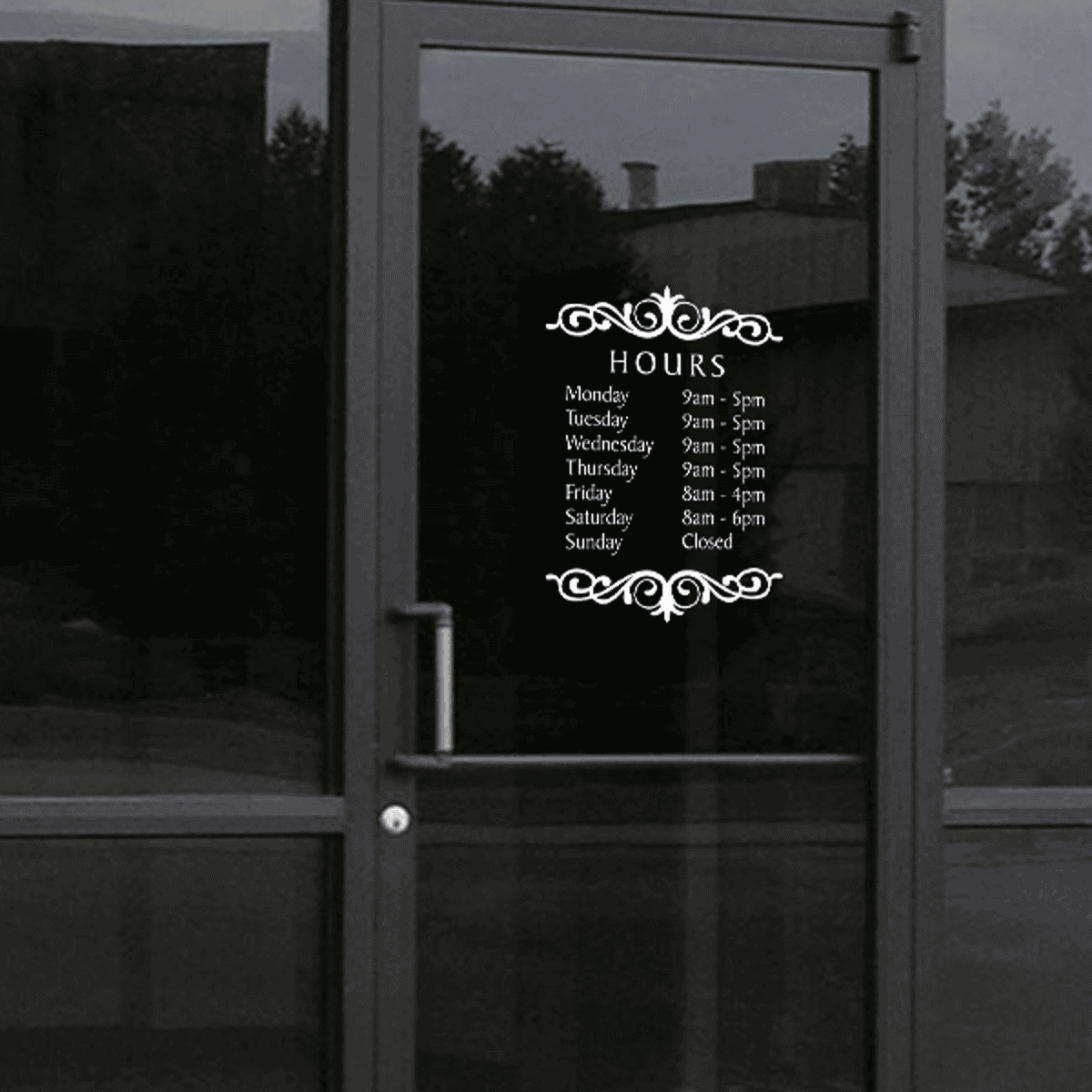 Baker Die Cut Hours of Operation Decal on a storefront window