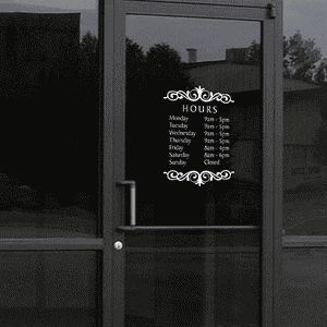 Baker Die Cut Hours of Operation Decal on a storefront window